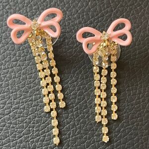 Pink ribbon and rhinestone chain earrings